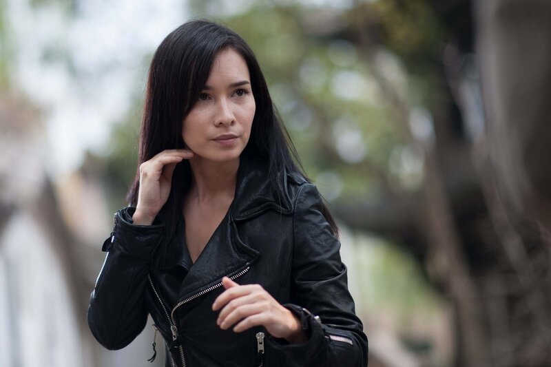woman in black leather jacket