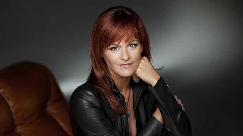 woman in black leather jacket
