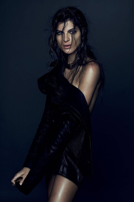 woman in black leather jacket