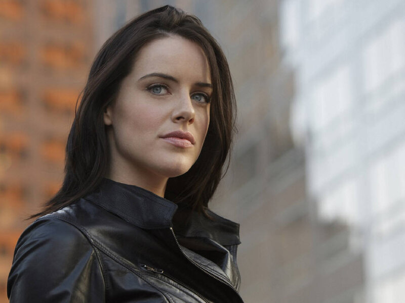 woman in black leather jacket