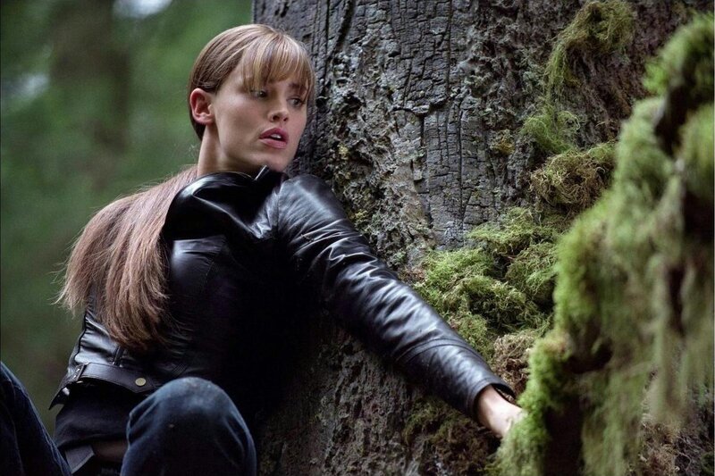 Woman in Black Leather Jacket — Tense