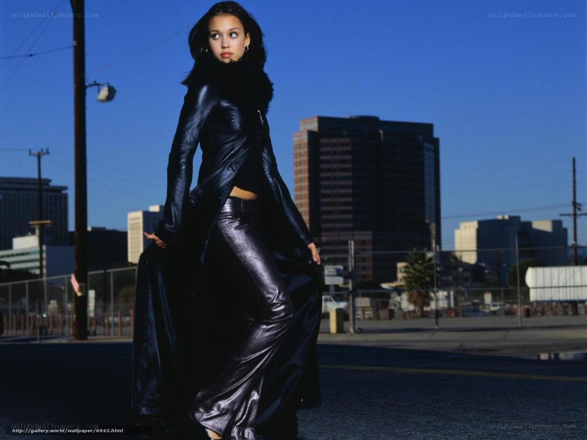 Woman in black leather outfit