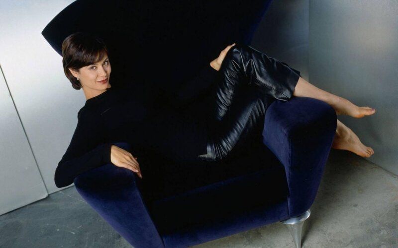 Woman in Black Leather Pants — Blue
