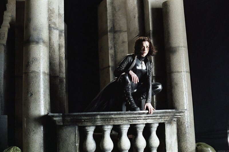 woman in black leather suit