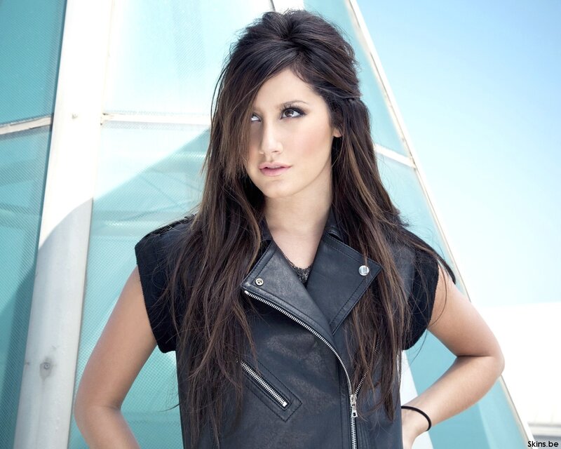 woman in black leather vest