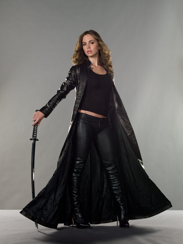 woman in black leather with sword