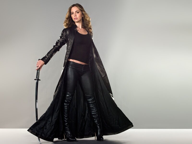 woman in black leather with sword