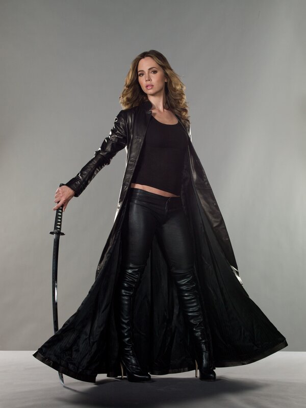 woman in black leather with sword