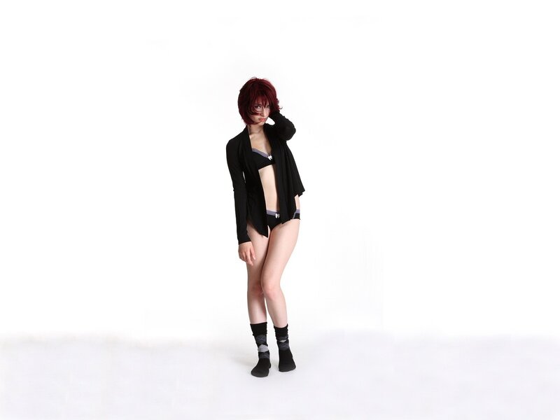 woman in black lingerie and cardigan
