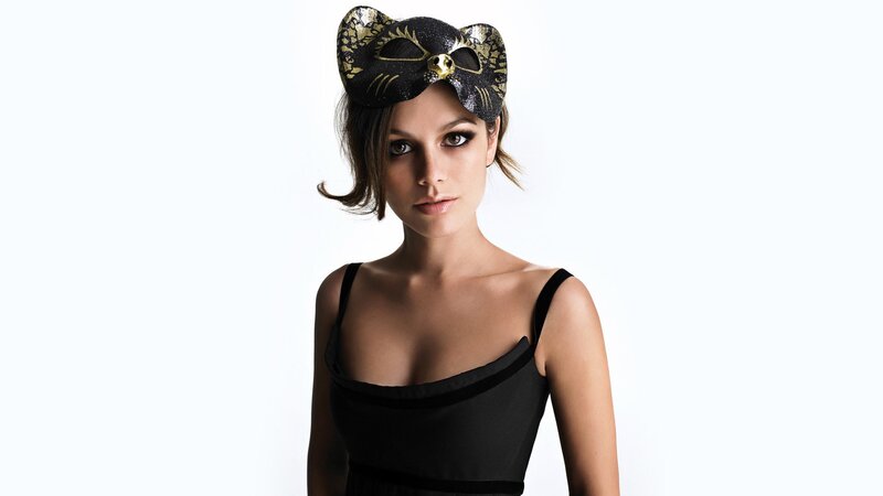 woman in black mask and dress