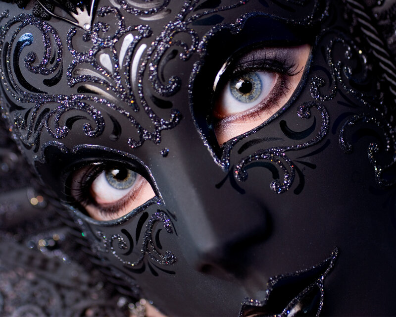 woman in black masquerade mask