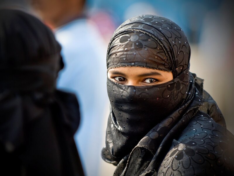 woman in black niqab