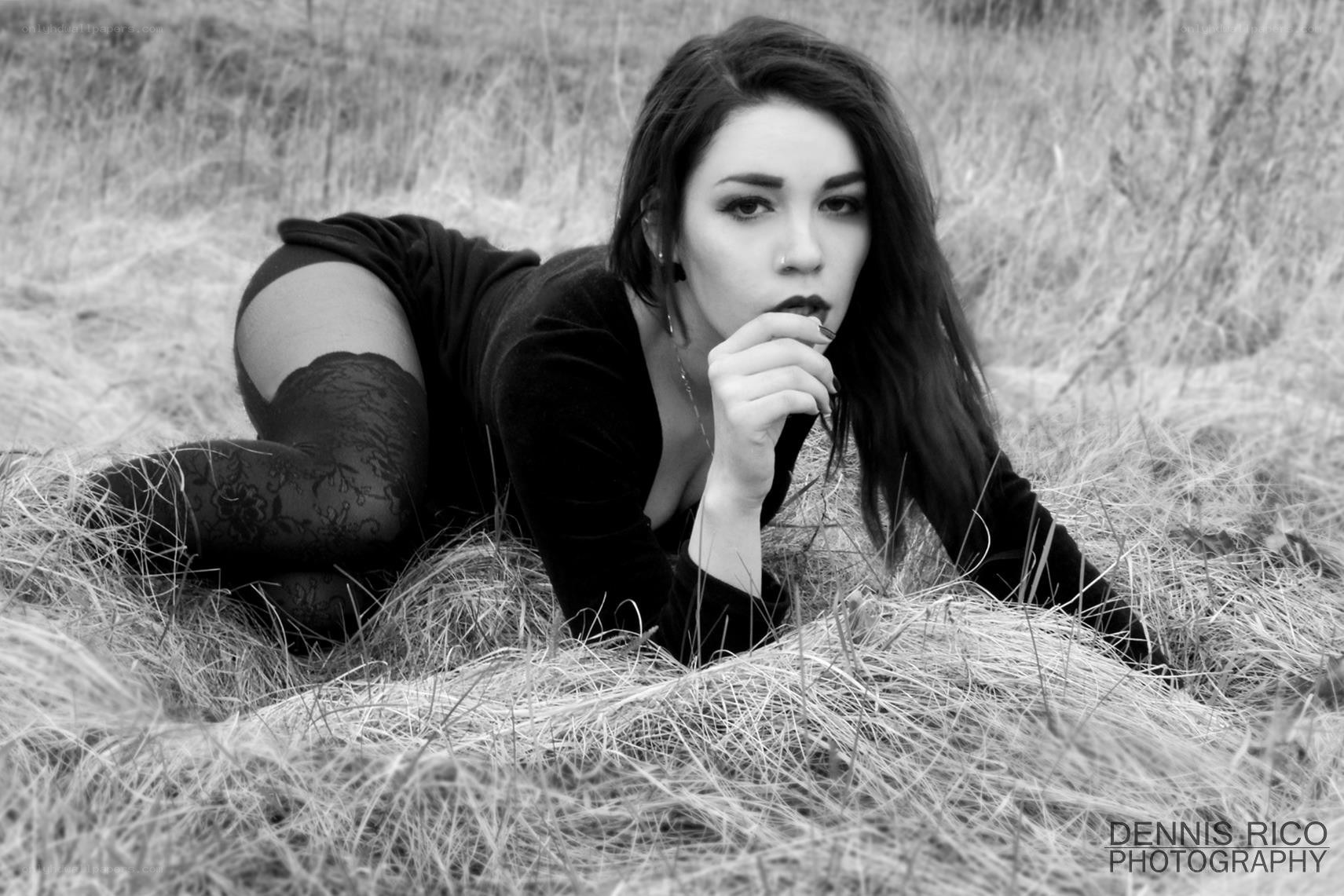 woman in black on grass