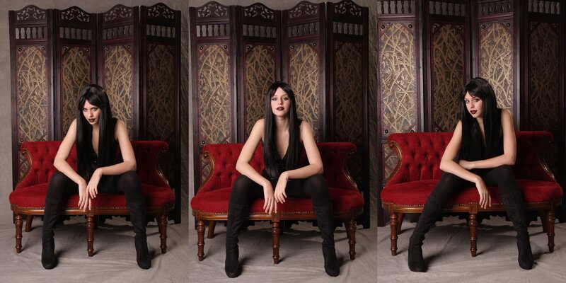 woman in black on red chair