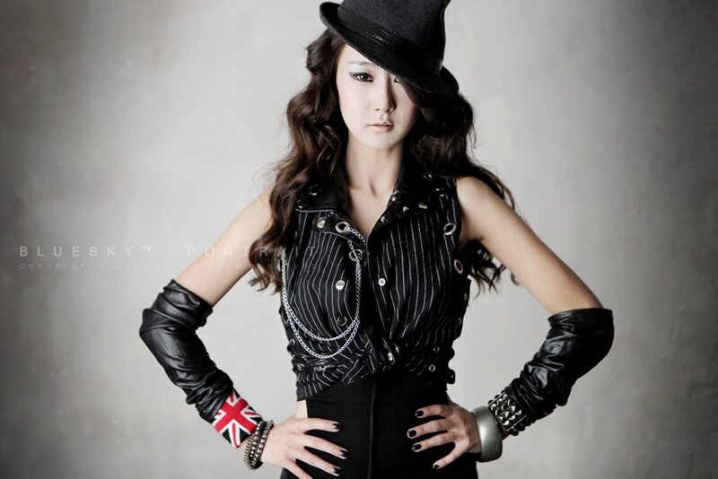 Woman in Black Outfit — Confident, Photograph, Hat, Gloves, Chains