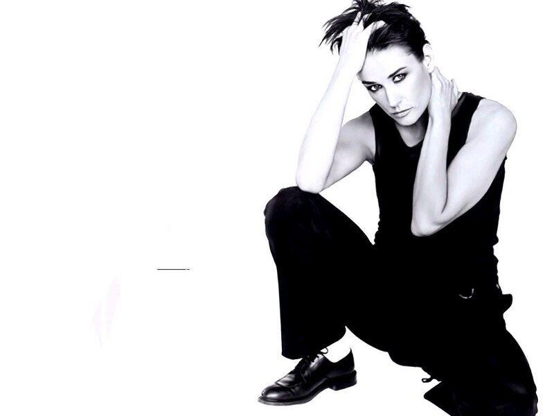 woman in black outfit crouching