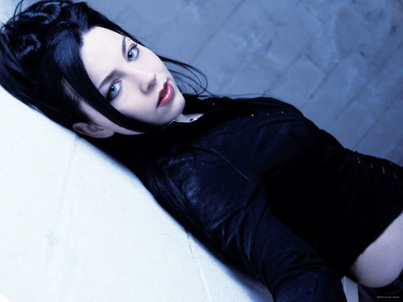 woman in black outfit lying down