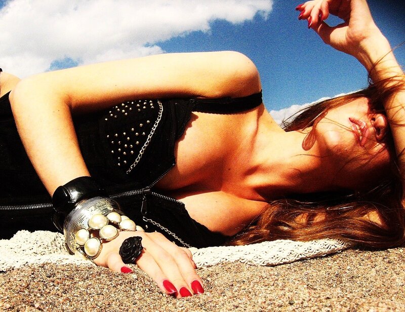 woman in black outfit on beach