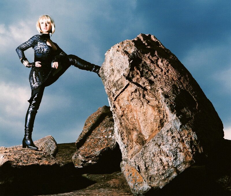 woman in black outfit on rocks