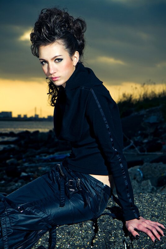 woman in black outfit on rocks