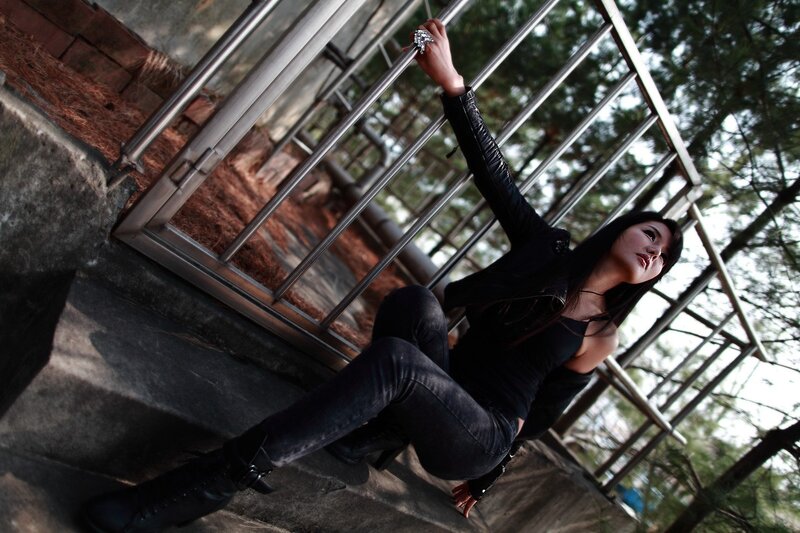 woman in black outfit on steps
