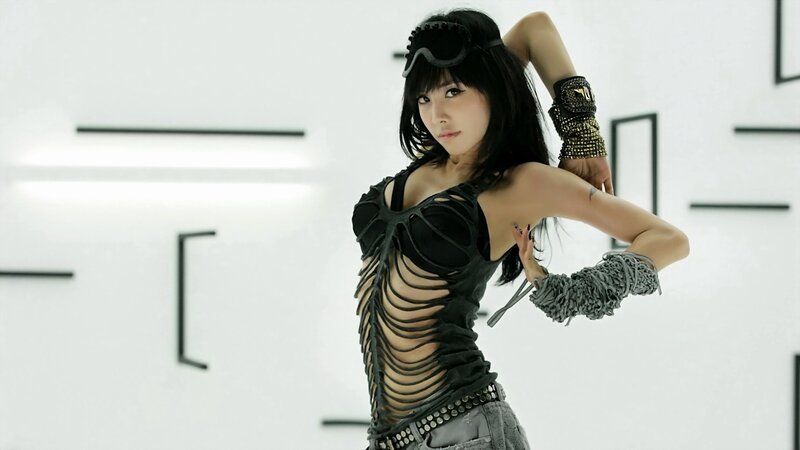 woman in black outfit posing