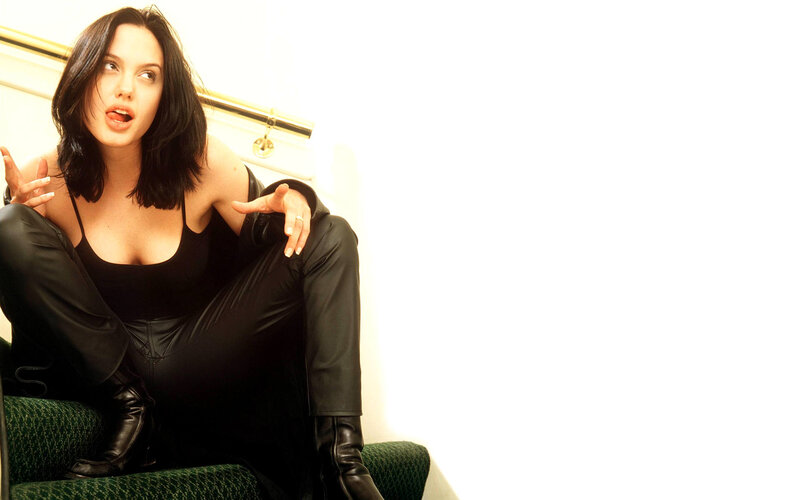 woman in black outfit sitting