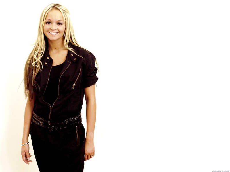 woman in black outfit smiling