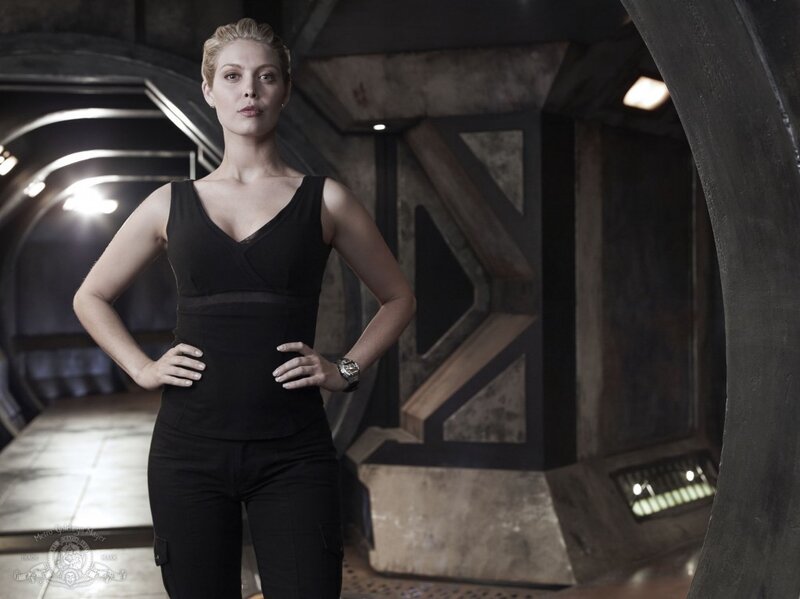 woman in black outfit standing