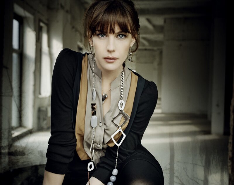 woman in black outfit with jewelry