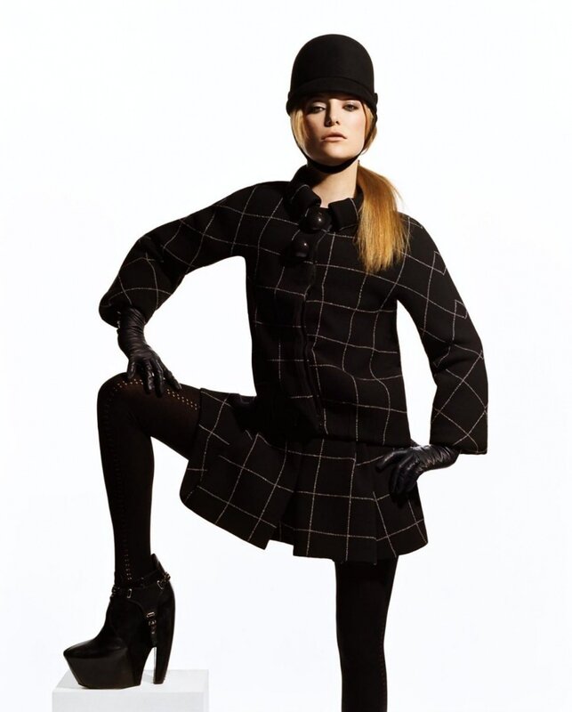 woman in black plaid coat