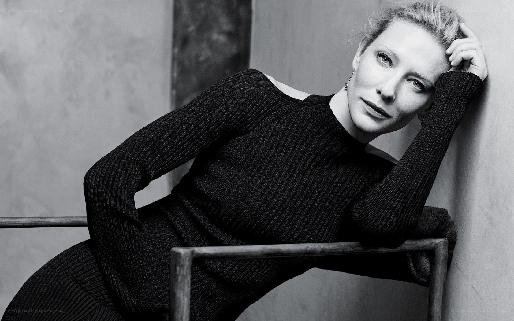 woman in black ribbed sweater