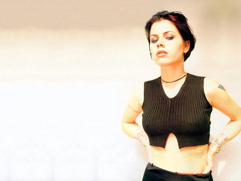Woman in black ribbed top