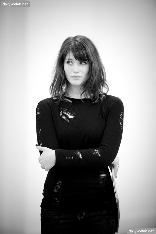 woman in black ripped sweater