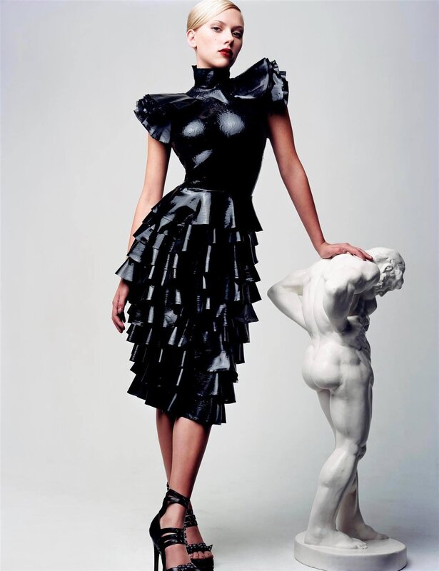 woman in black ruffled dress