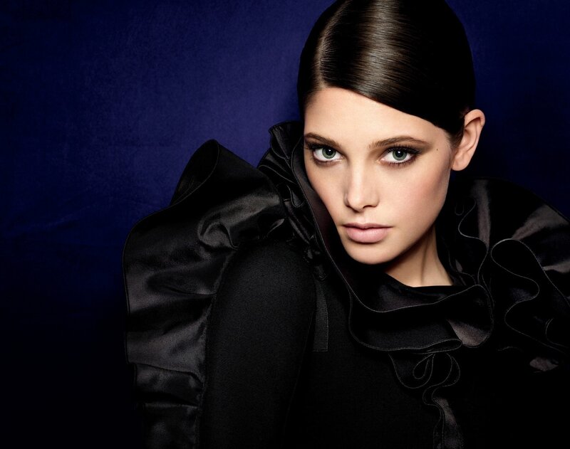 woman in black ruffled garment