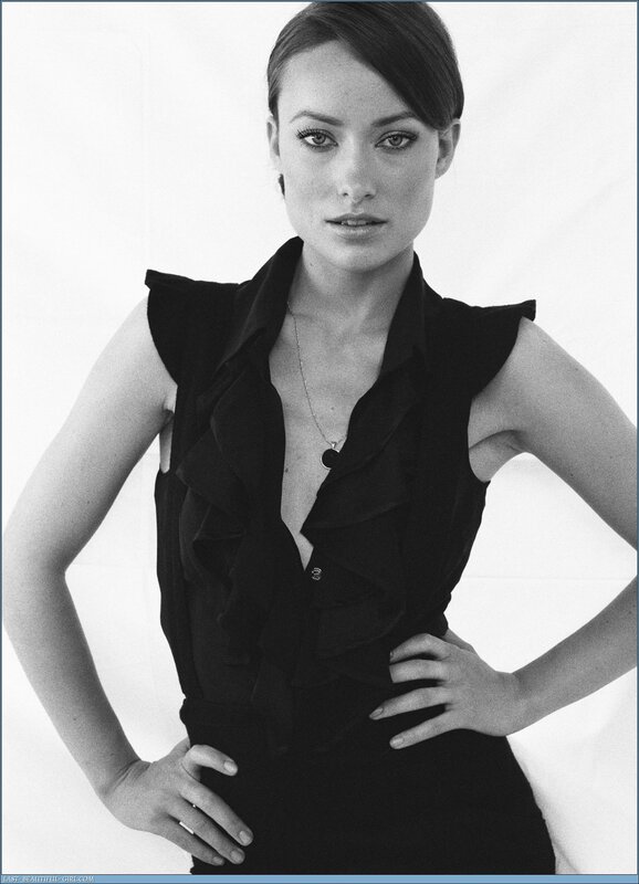 woman in black ruffled top