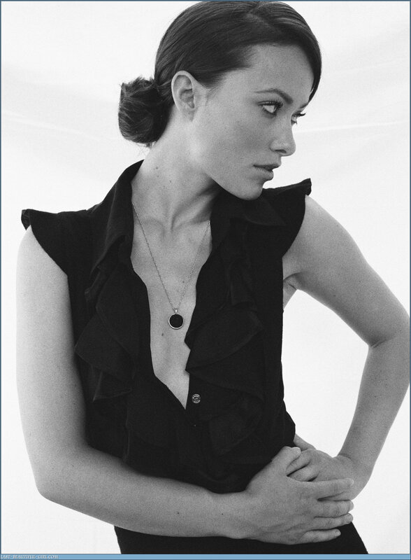 woman in black ruffled top