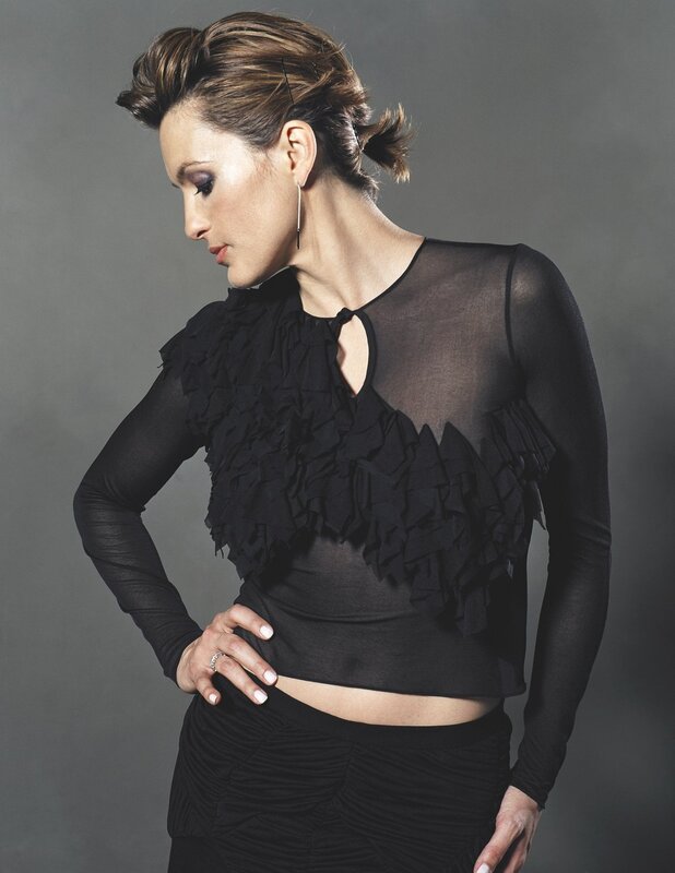 woman in black ruffled top