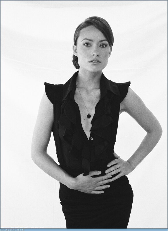 woman in black ruffled top