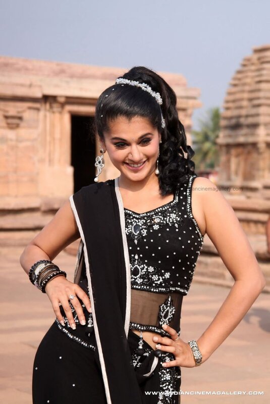 woman in black sari smiling
