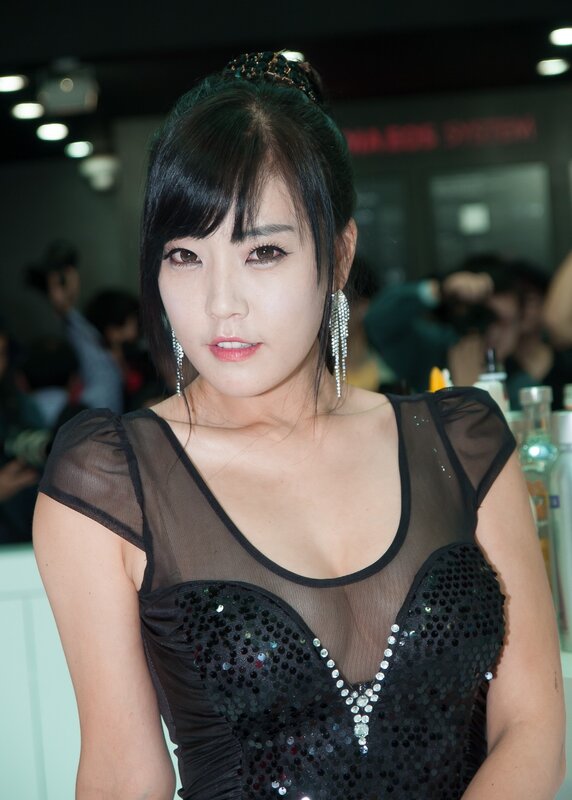 woman in black sequined dress