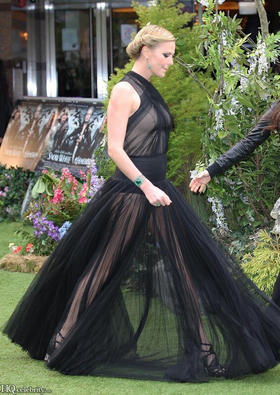 Woman in black sheer gown