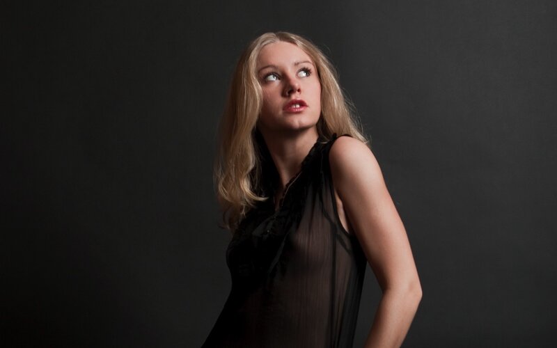 woman in black sheer top