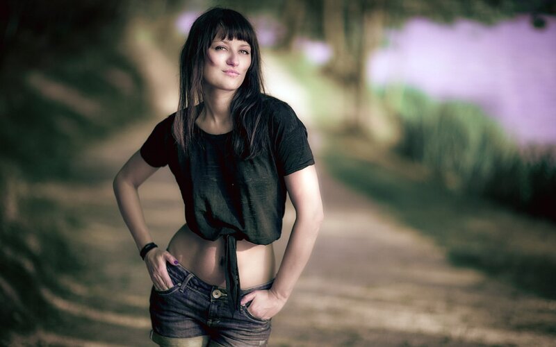 Woman in Black Shirt — Confident, Afternoon, Photograph, Shorts