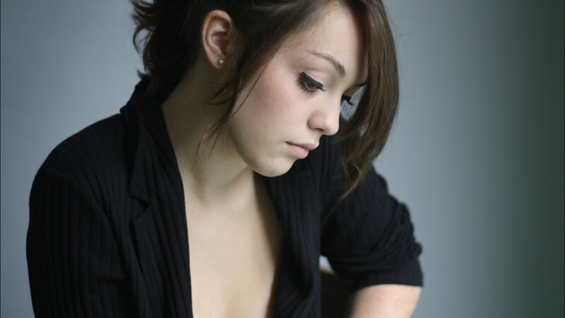 Woman in Black Shirt — Contemplative, Photograph