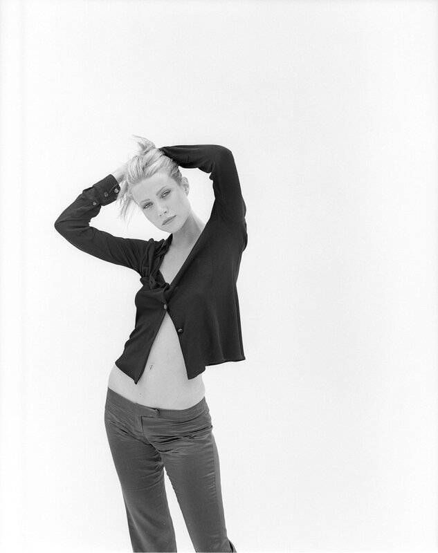 woman in black shirt posing