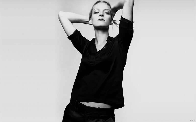 woman in black shirt posing