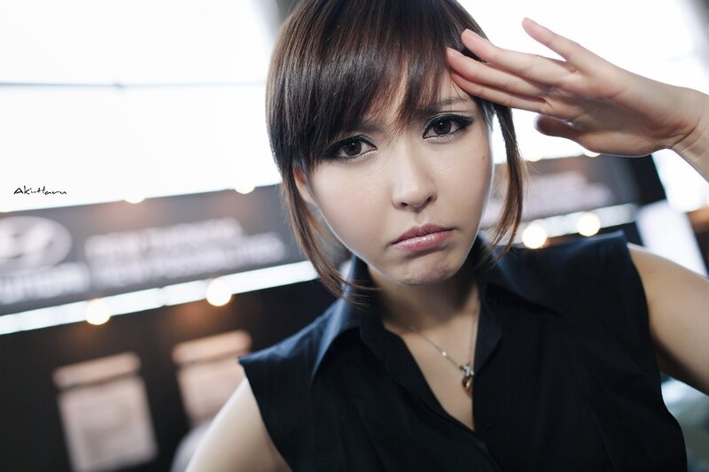 woman in black shirt posing