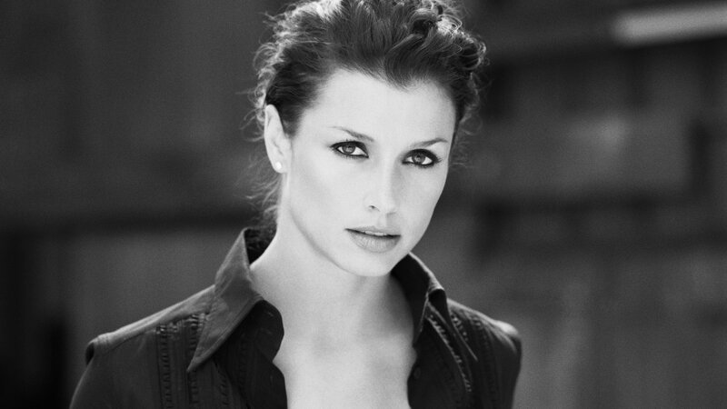 Woman in Black Shirt — Serious, Photograph, Earring